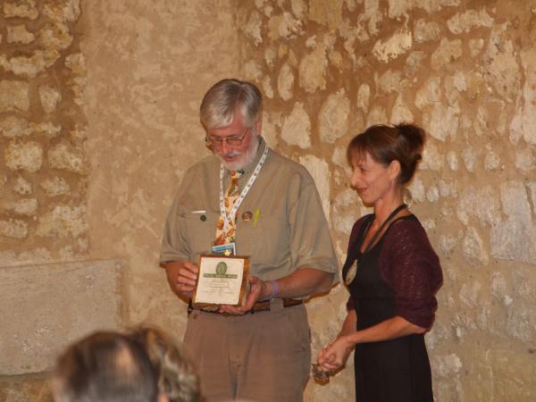01/10/12. Château Carbonnieux, Gala Dinner.Guy Sternberg accepting Doug McCreary's Special Service Award. Photo: J. MacEwen.